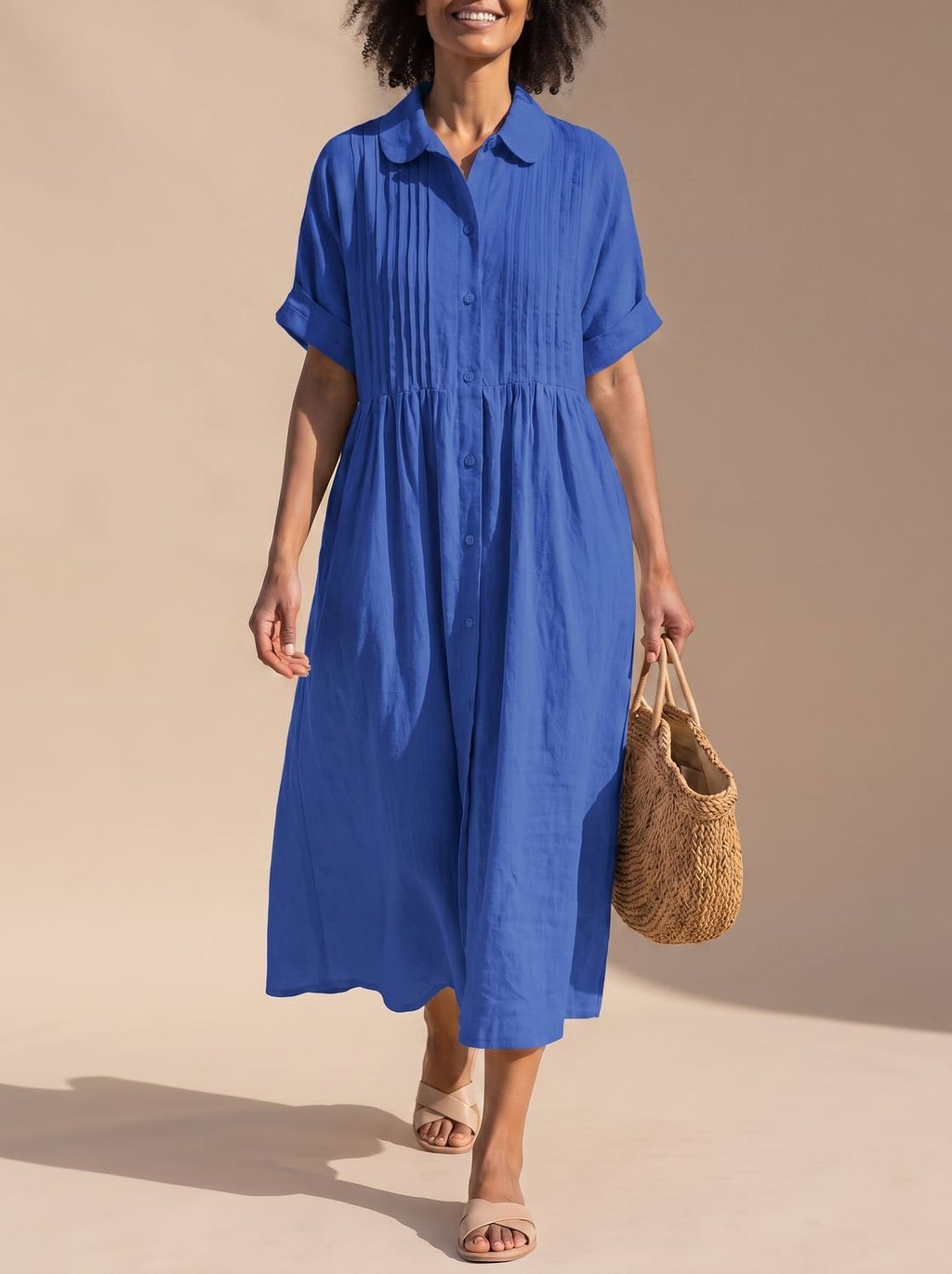 Vestido camisero midi de algodón en color azul claro, vista frontal completa